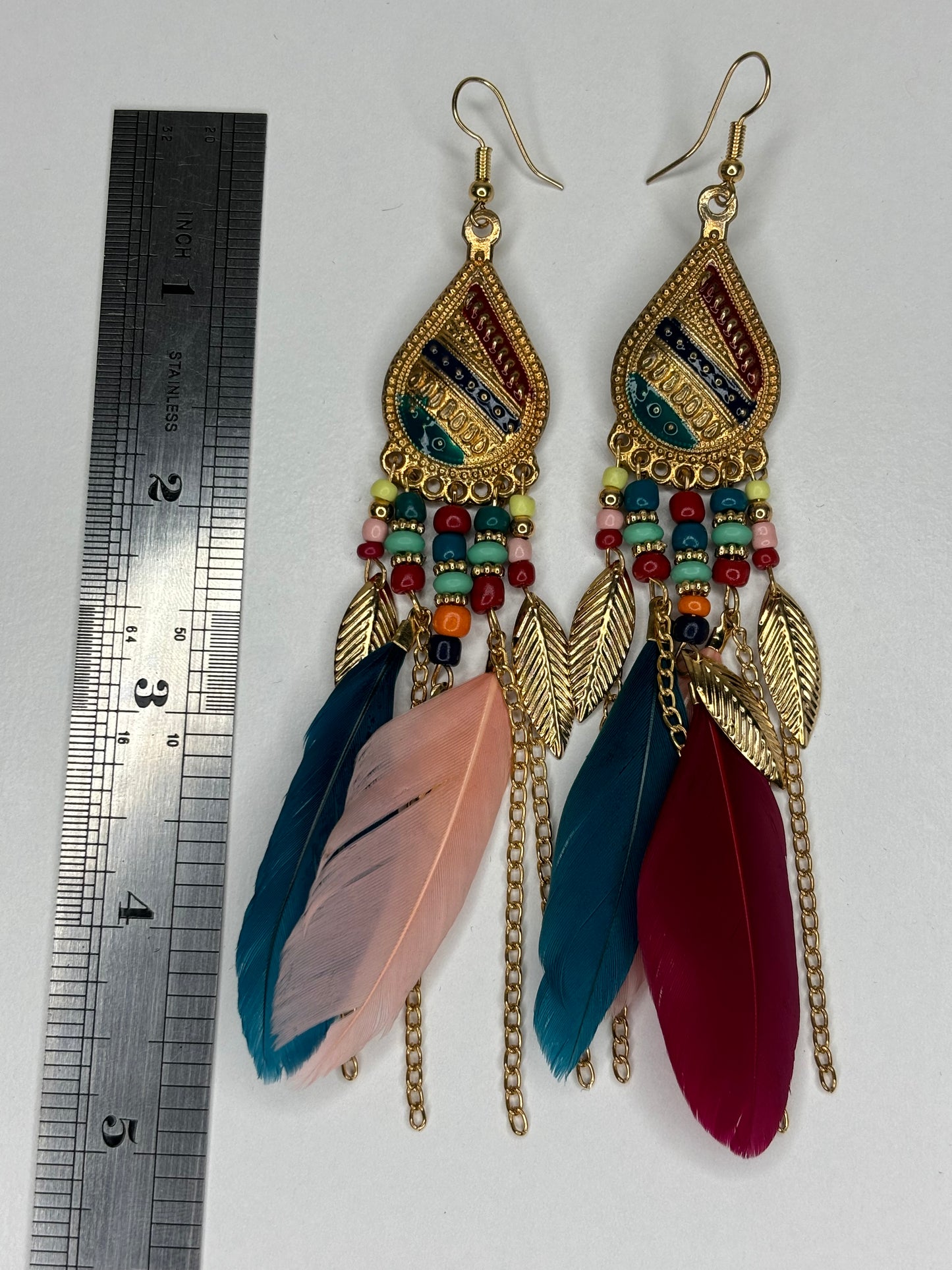 B038 Long 4” Gold Tone and Feather Earrings