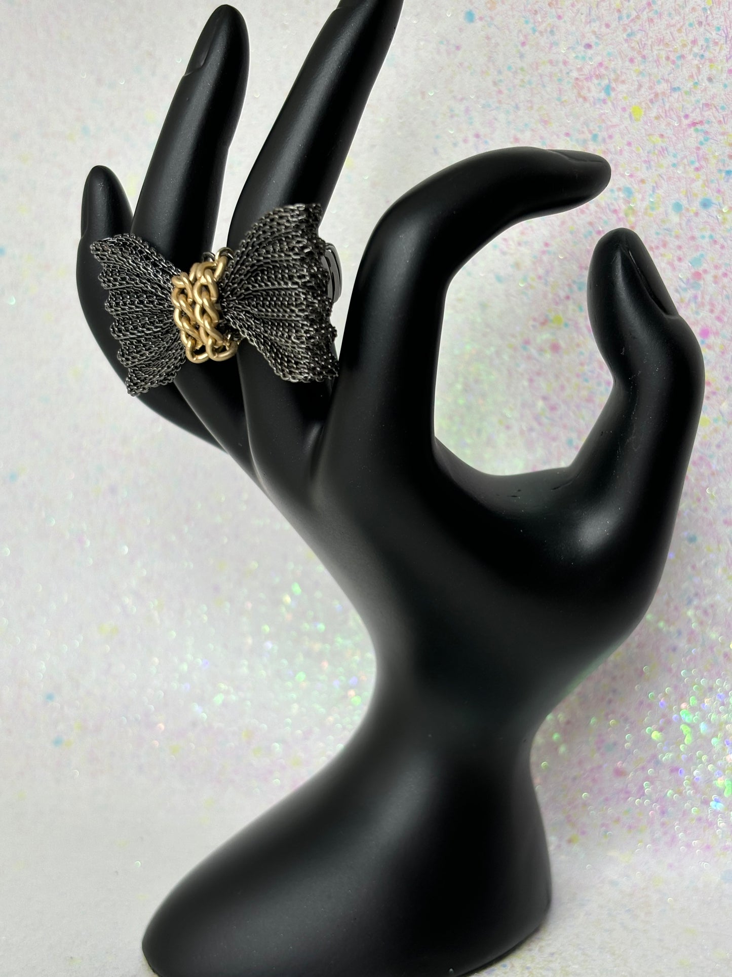 A095 Stretchy Black/Gold Bow Ring