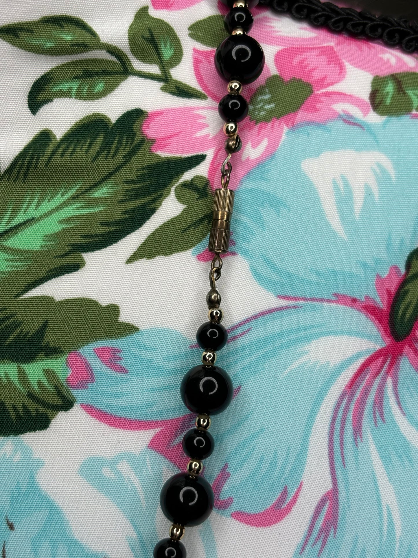 A179 Black and Gold Beaded Necklace 24”