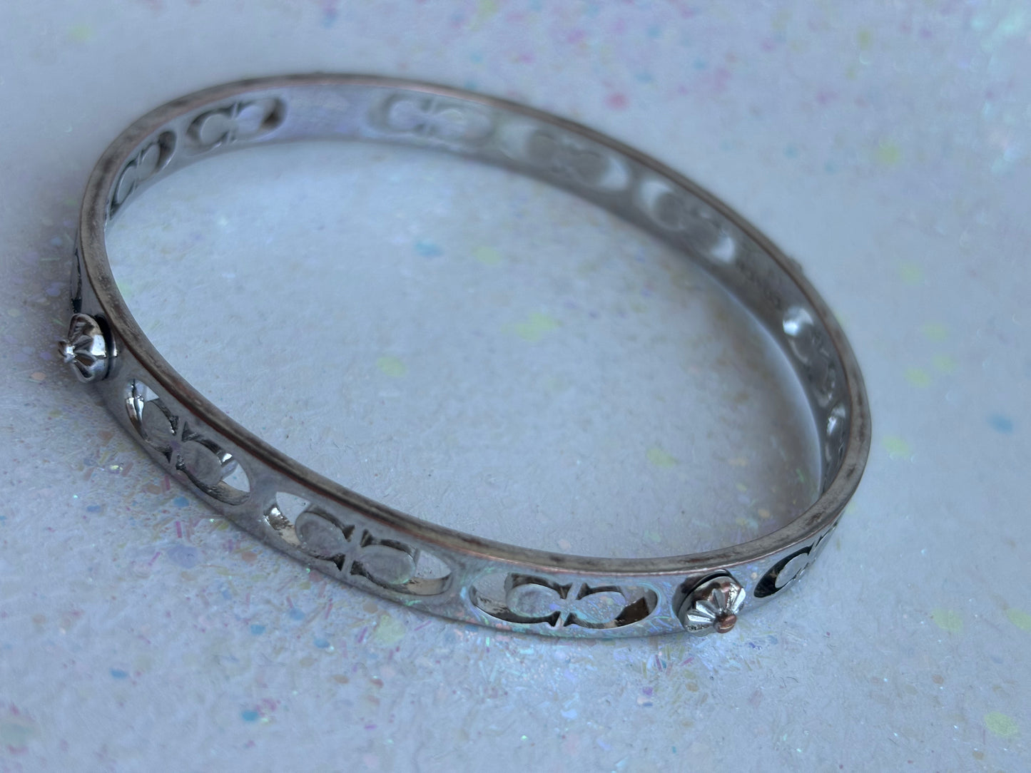 #0028 Coach Silver Toned Bangle