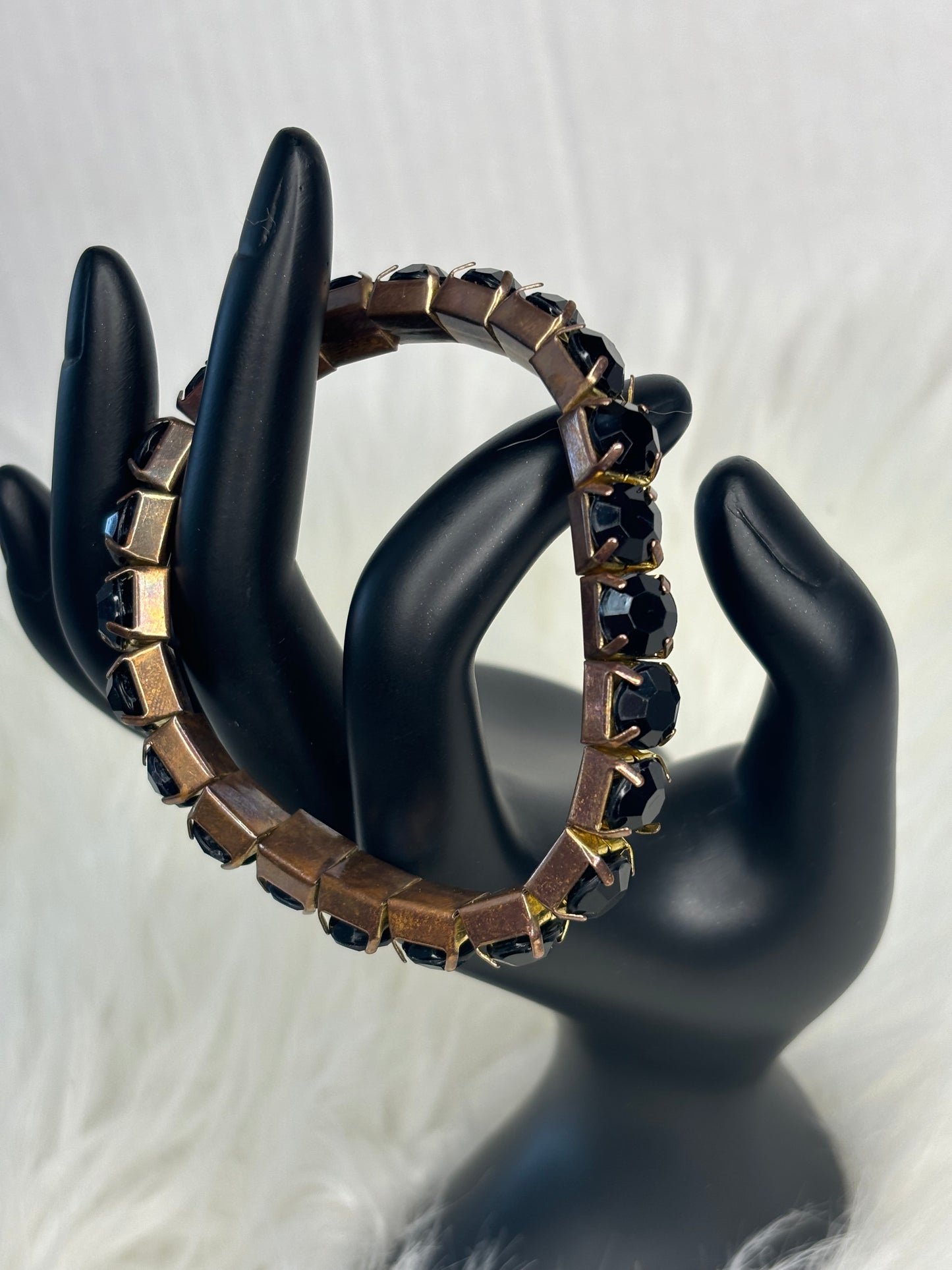 A206 Black and Gold Tone Stretch Bracelet