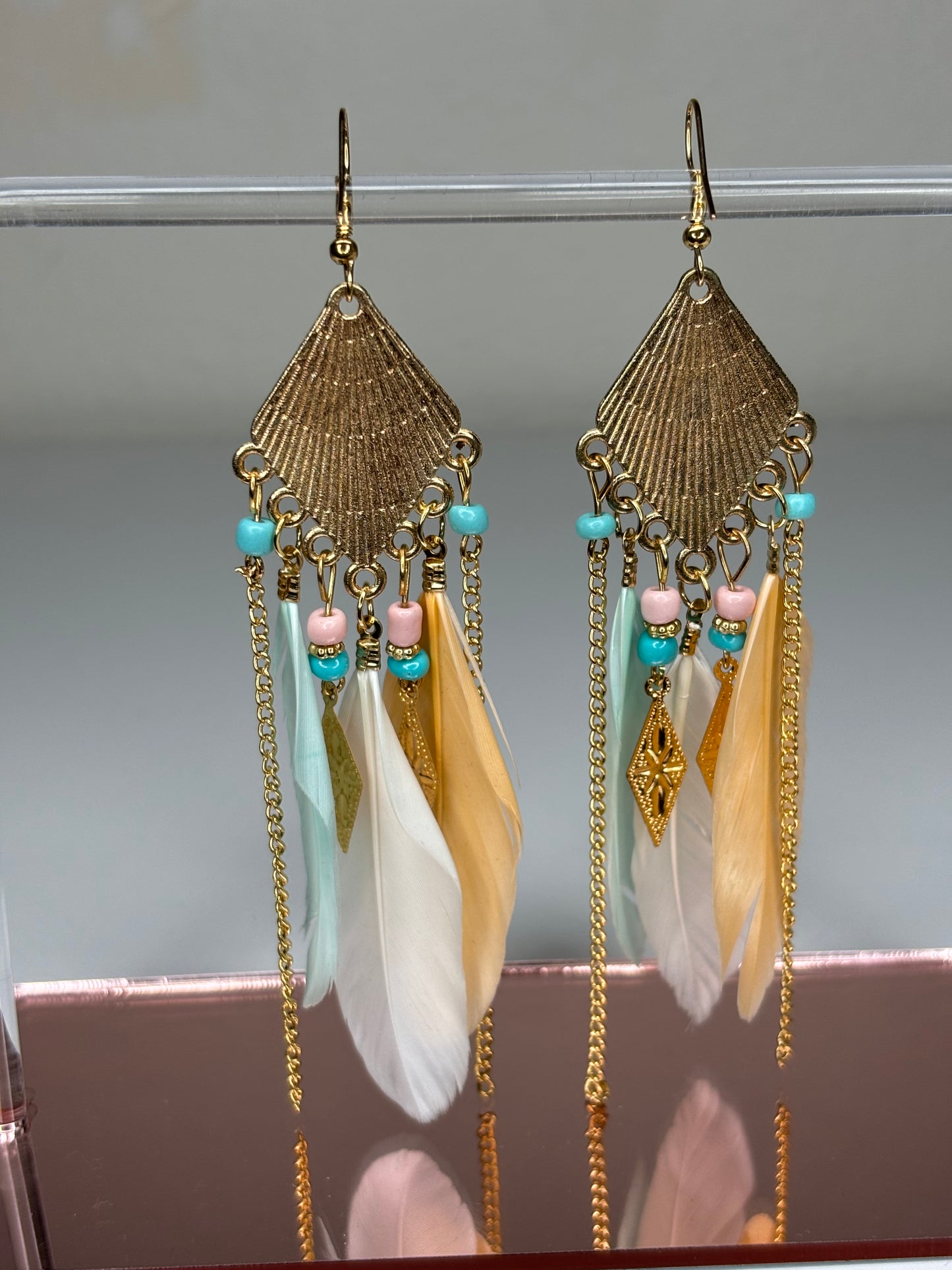 C004 Long 4” Gold Tone and Feather Earrings