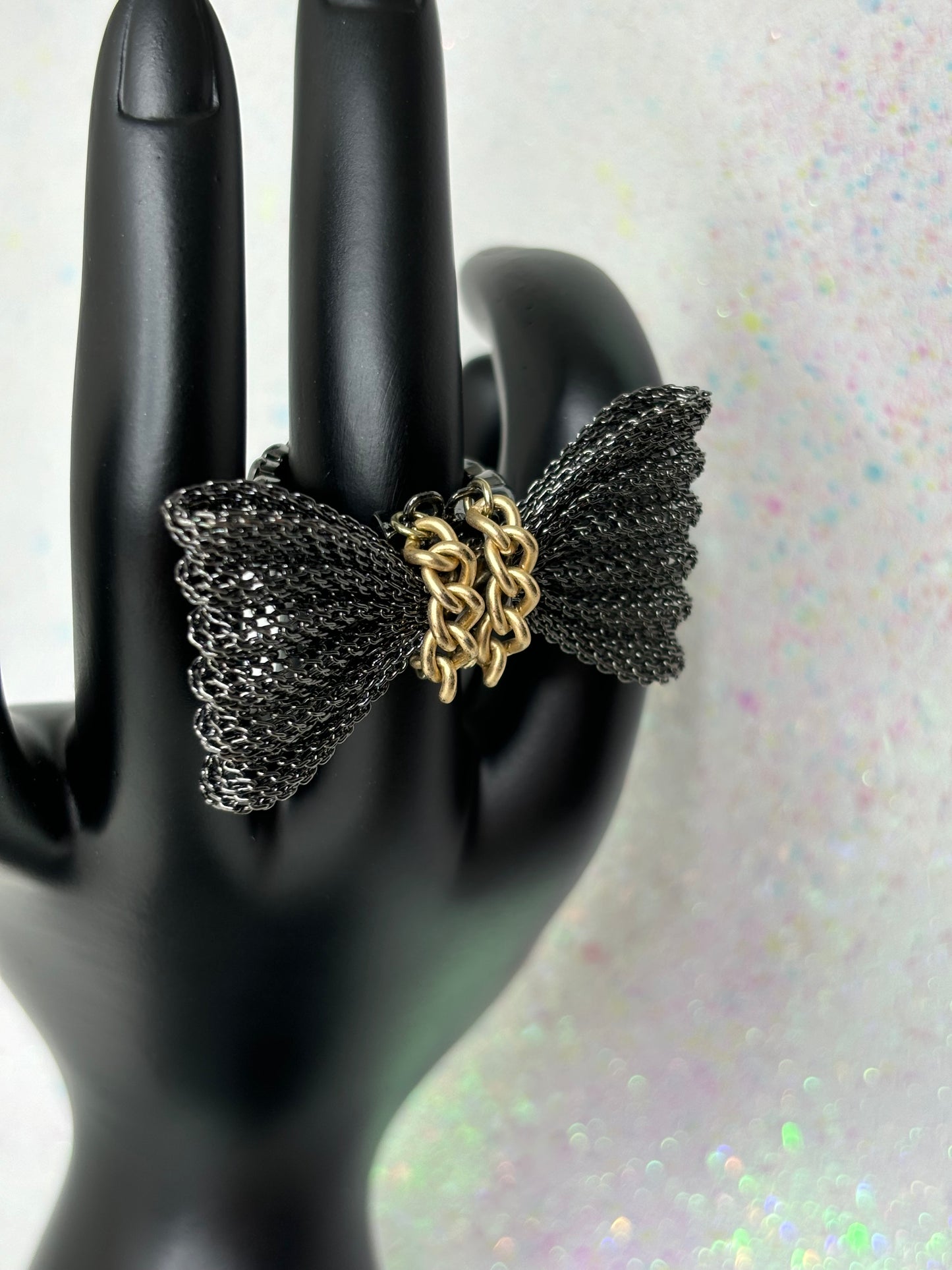 A095 Stretchy Black/Gold Bow Ring