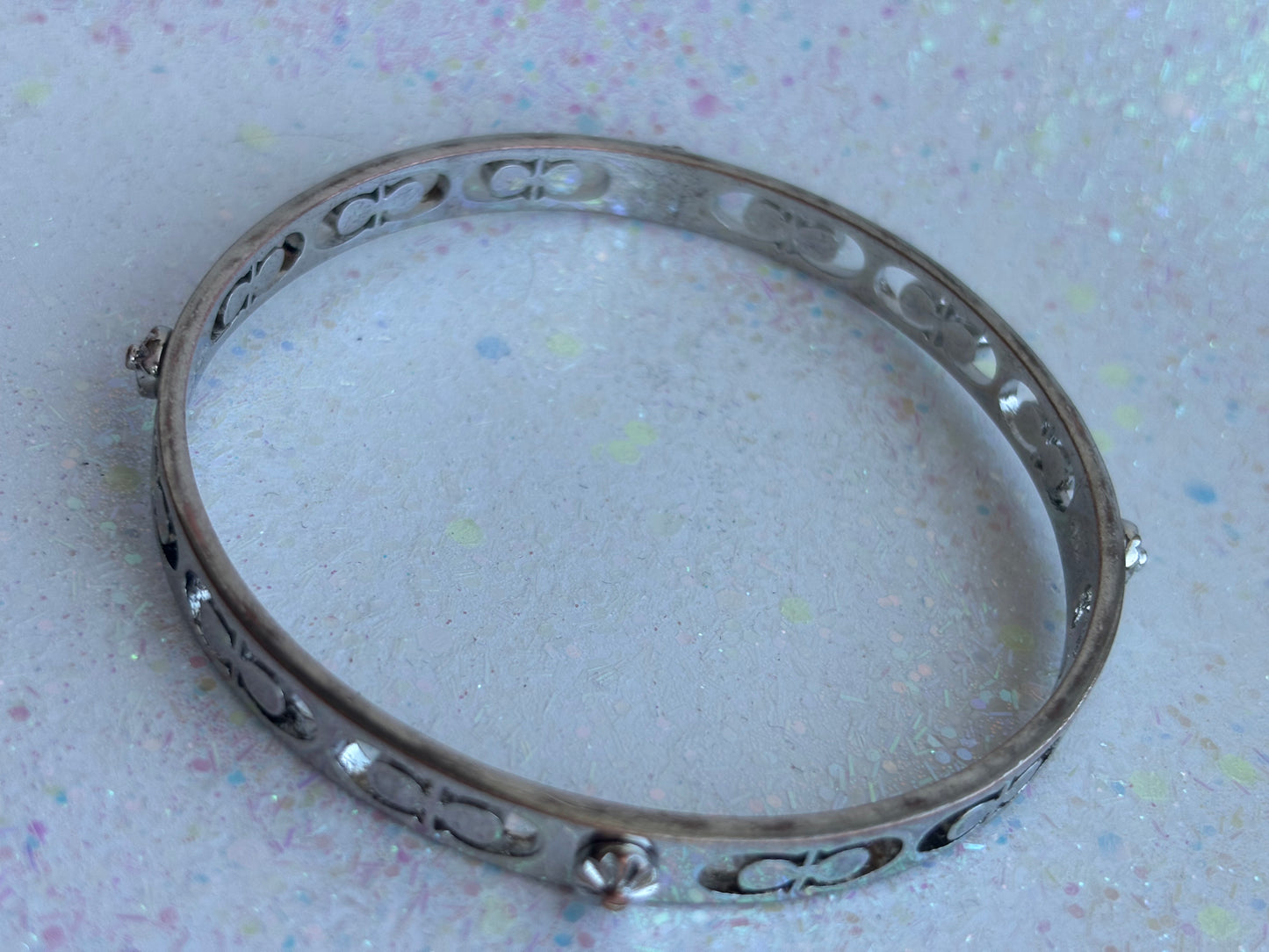 #0028 Coach Silver Toned Bangle