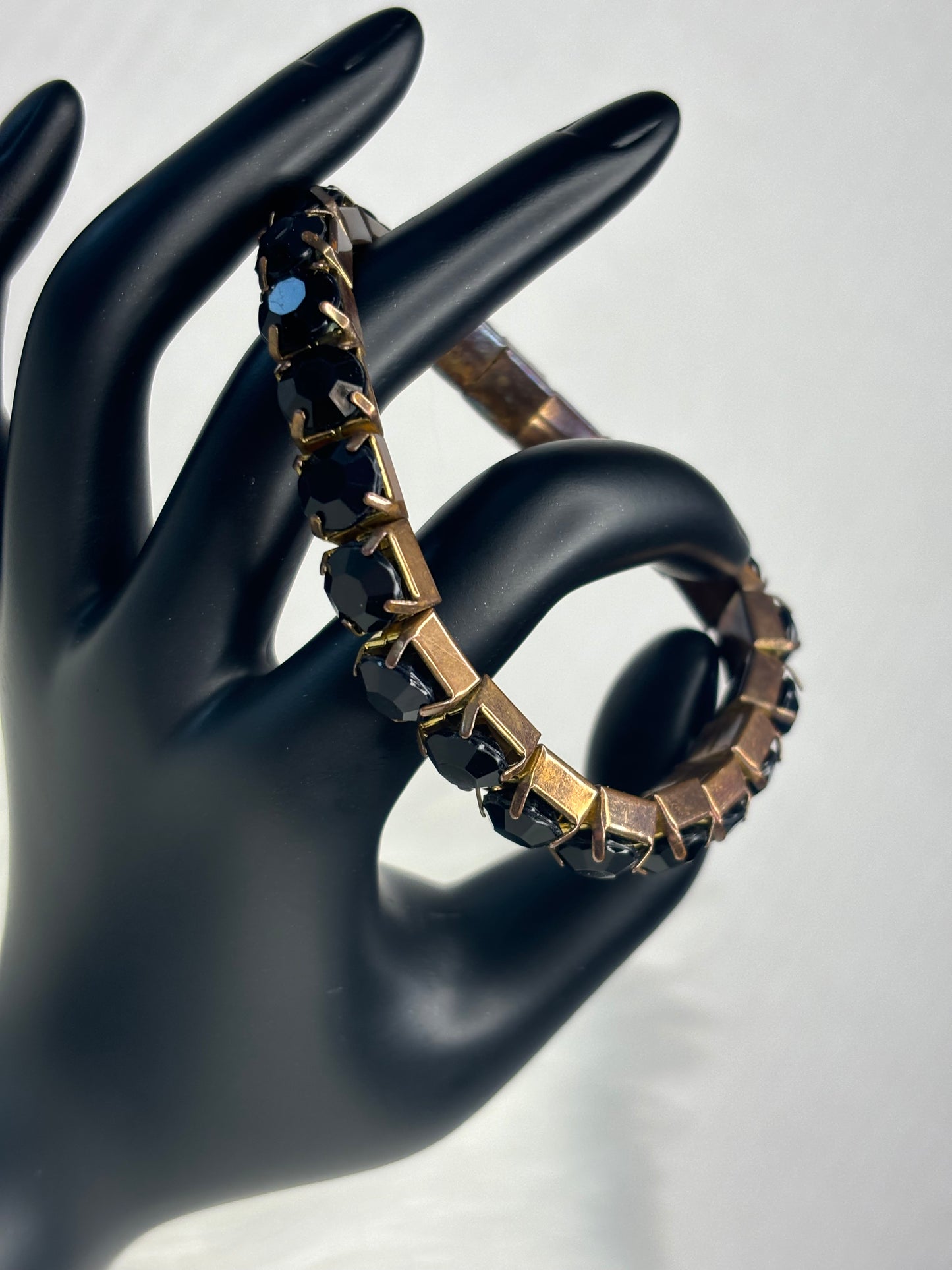 A206 Black and Gold Tone Stretch Bracelet