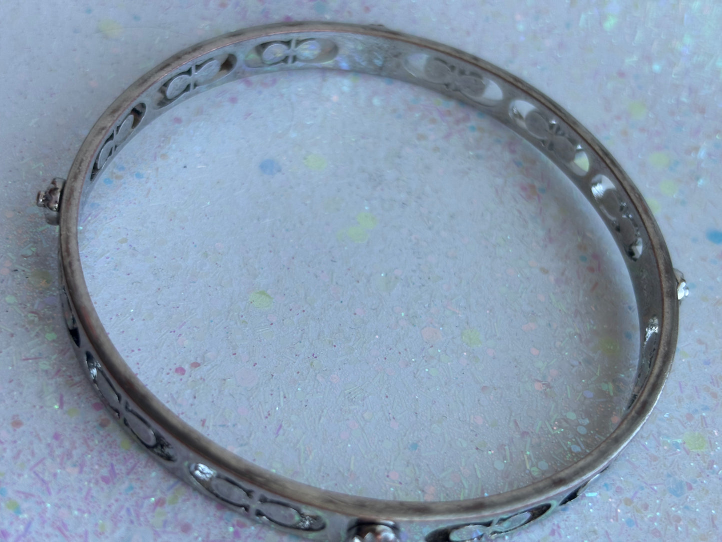 #0028 Coach Silver Toned Bangle