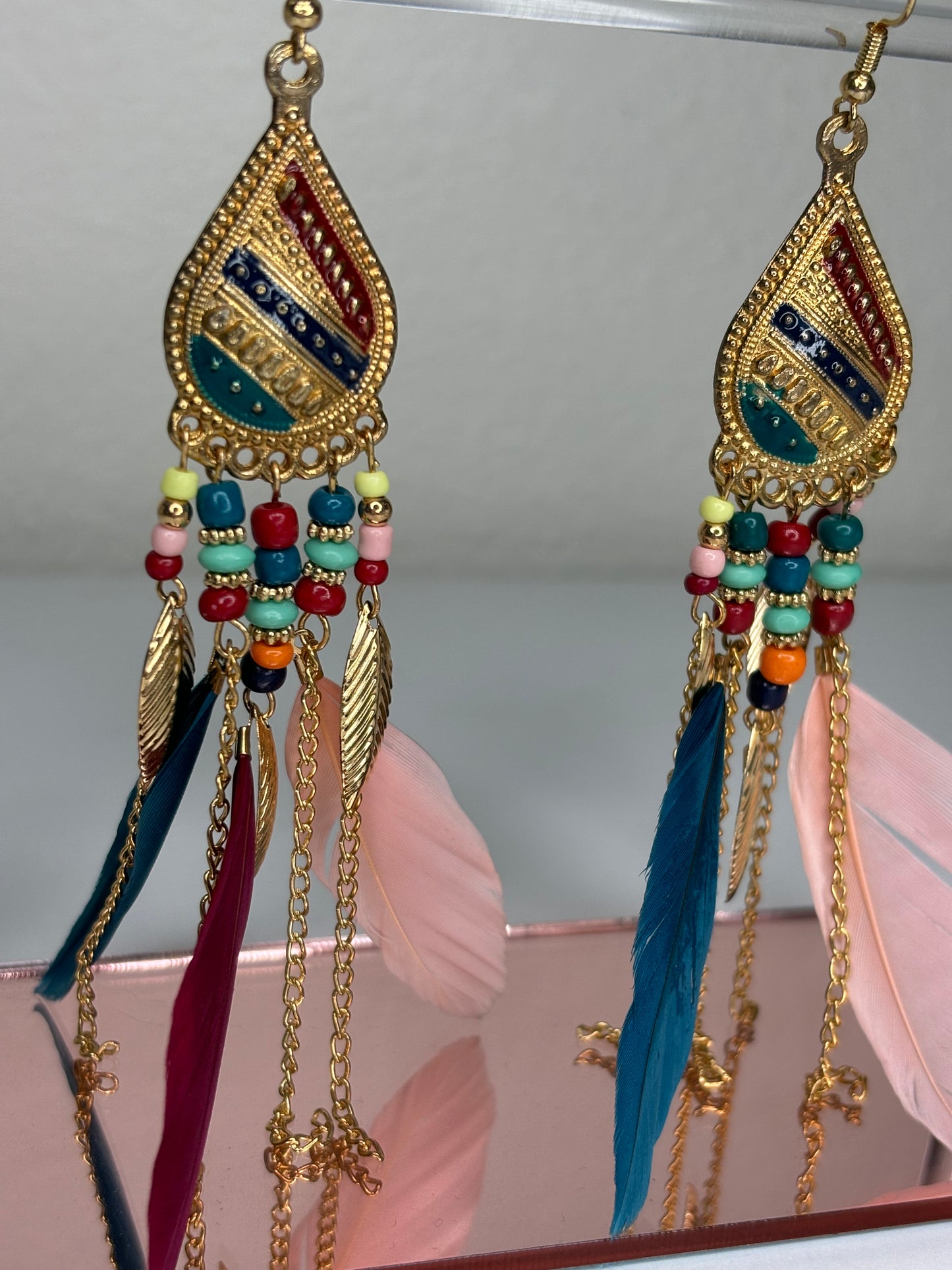 B038 Long 4” Gold Tone and Feather Earrings