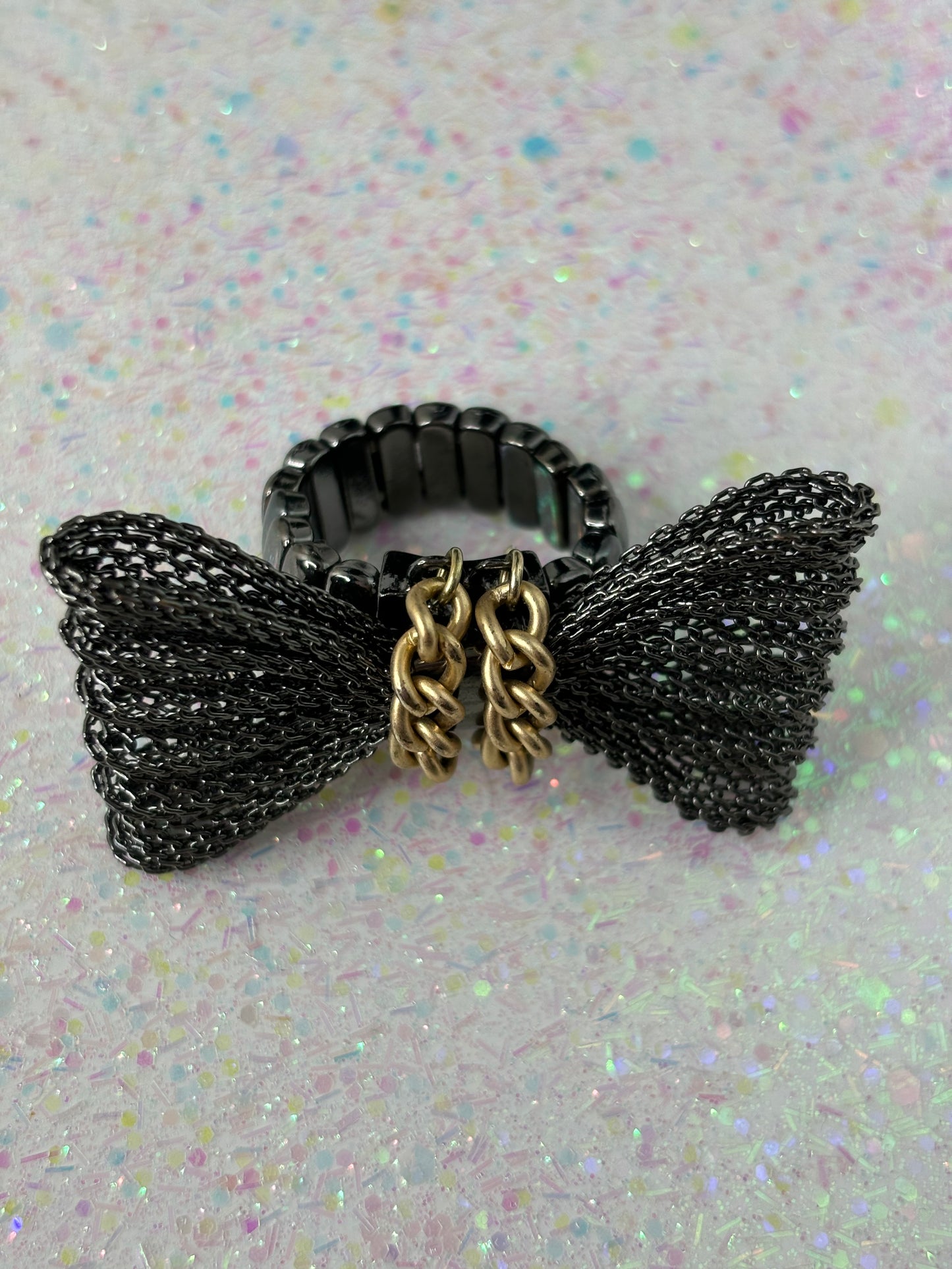 A095 Stretchy Black/Gold Bow Ring