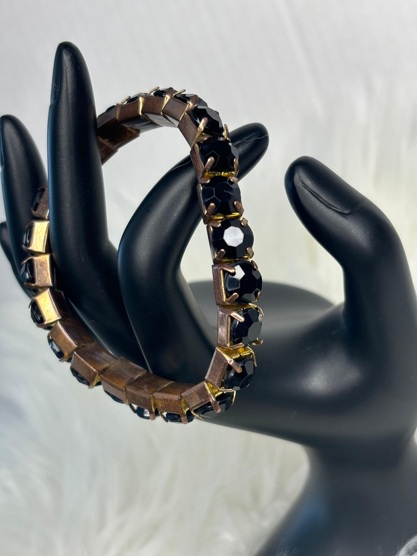 A206 Black and Gold Tone Stretch Bracelet